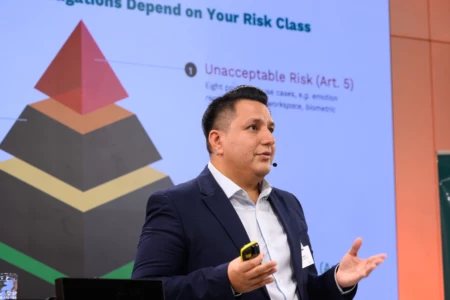 Compliance experts gives a talk about the EU AI Act.