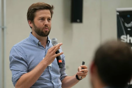 AI gives a talk about how SMEs can use AI to stay competitive